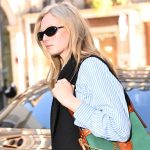 Alex Consani wears Versace Pivot